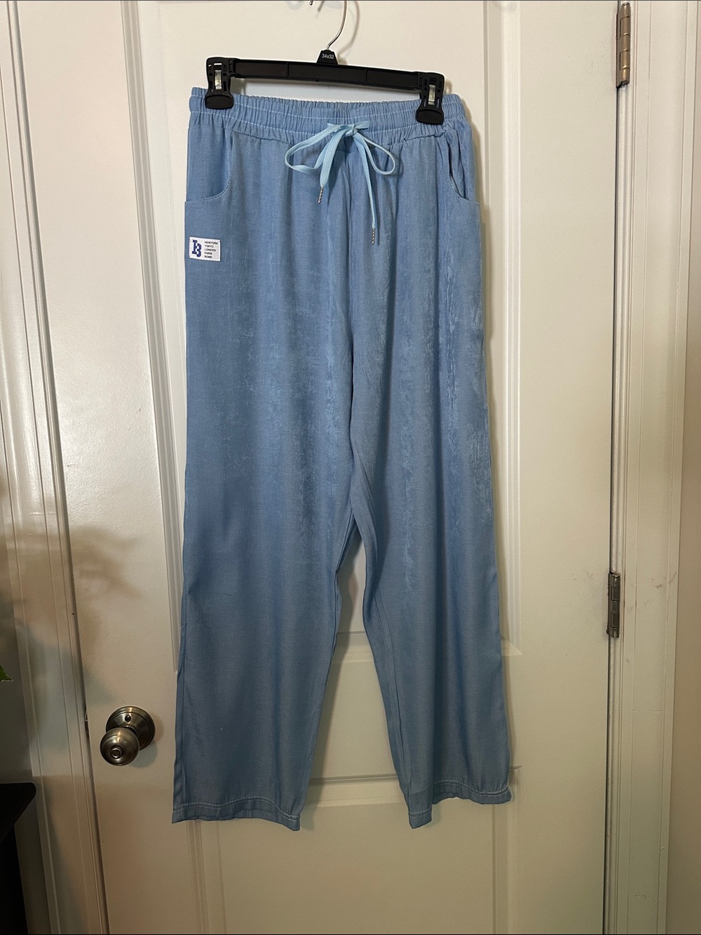 Cozy Light Blue Women's Drawstring Joggers NWOT NO SIZE TAG ON RHE PANTS.